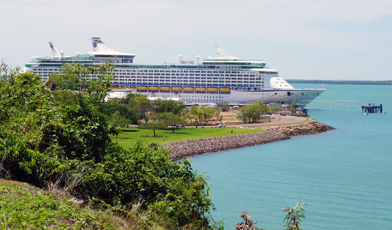 White cruise ship on sea docked in Darwin Harbour, Northern Territory Australia