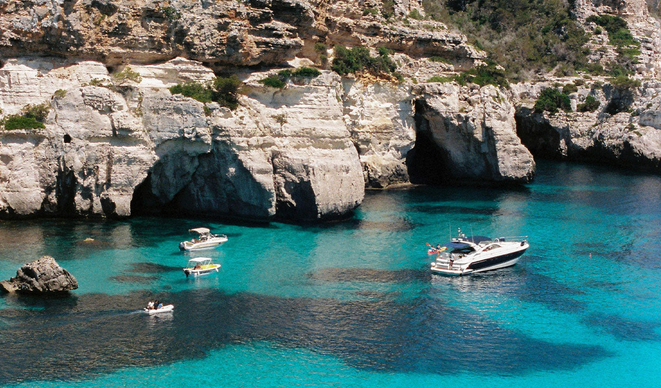 kayaking in fornells bay in spain