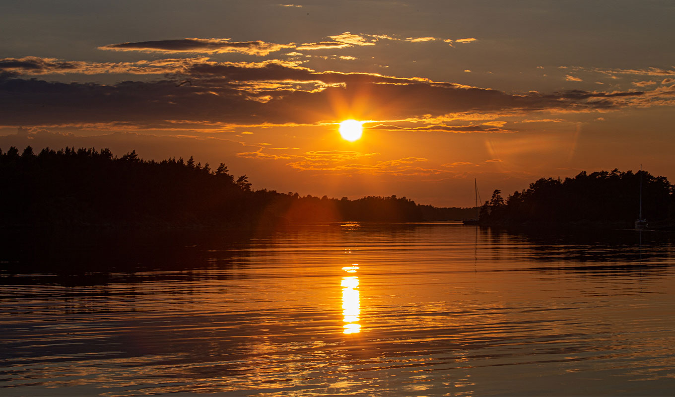 sun setting on a lake
