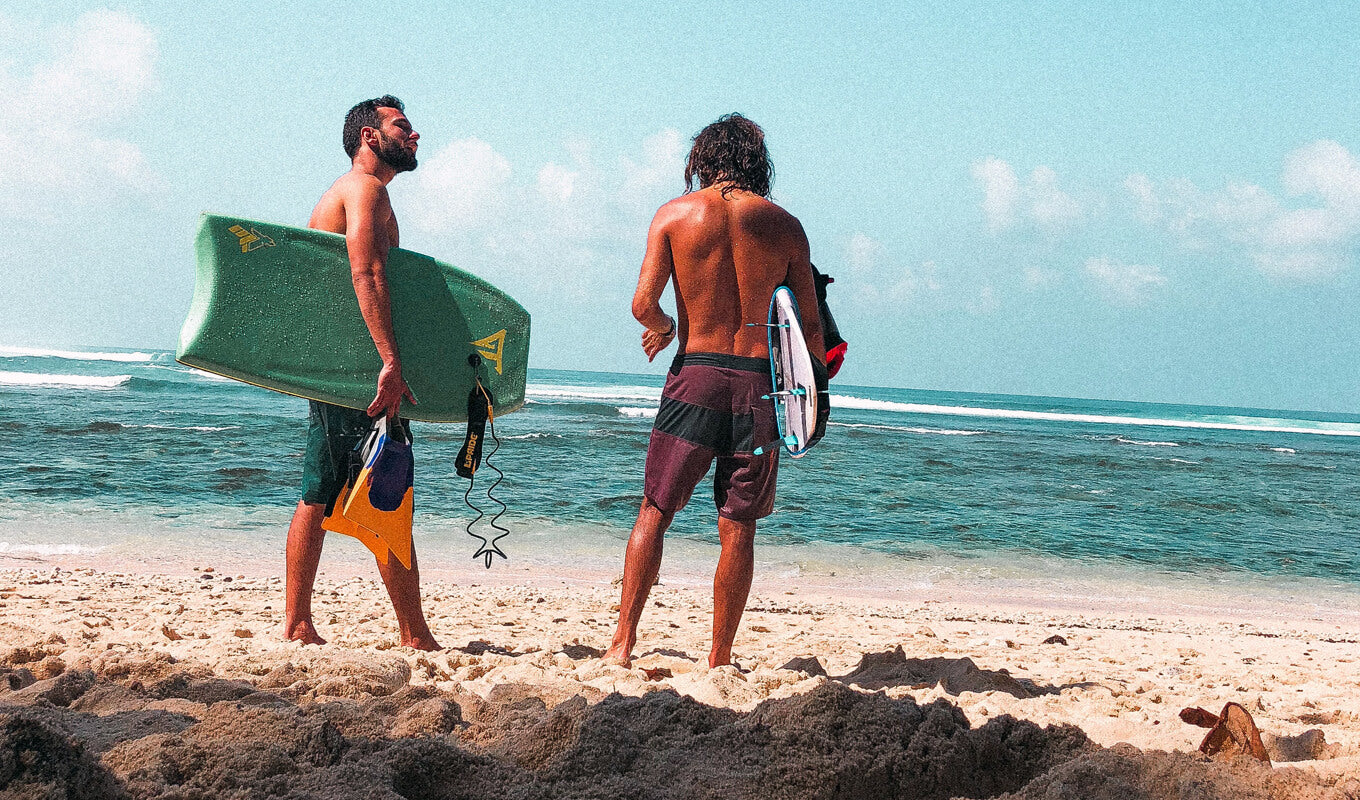 Man holding a colorful boogie board