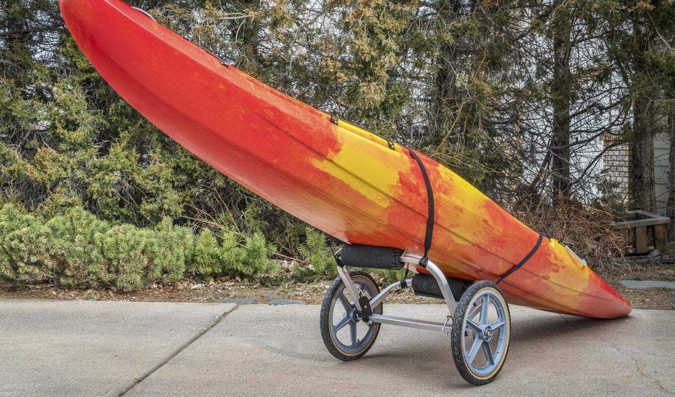 Kayak loaded on a kayak cart
