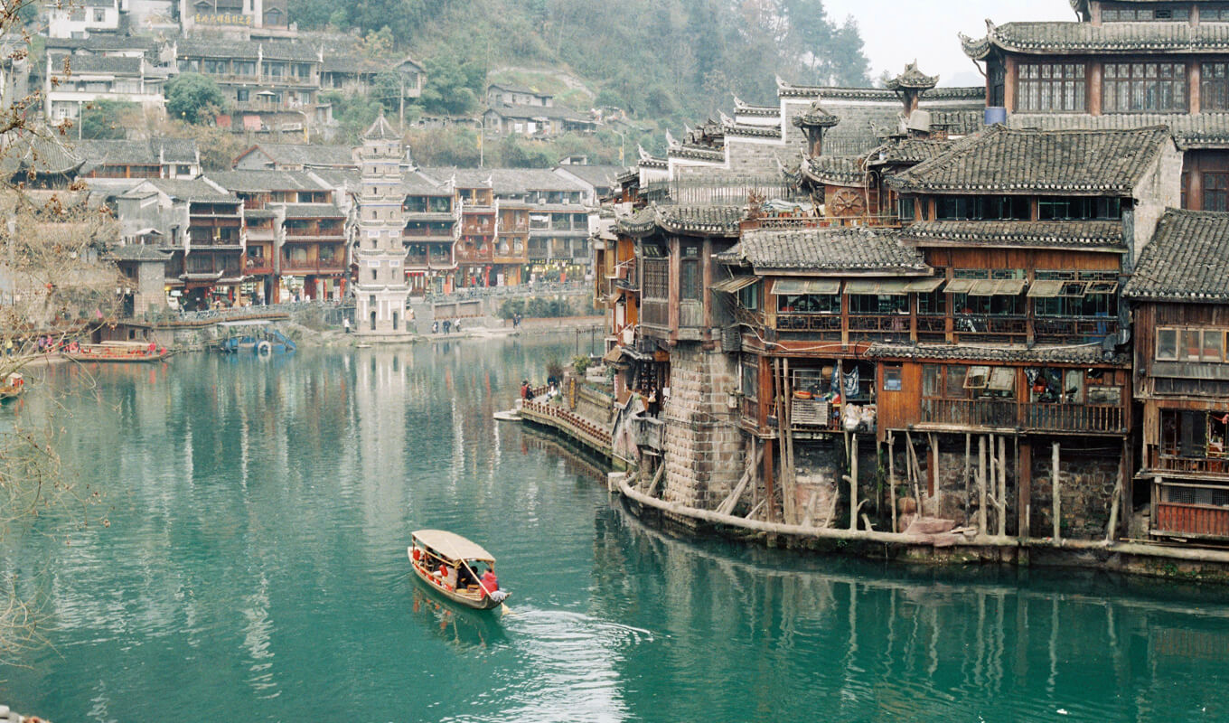 Boat near a wooden village structure