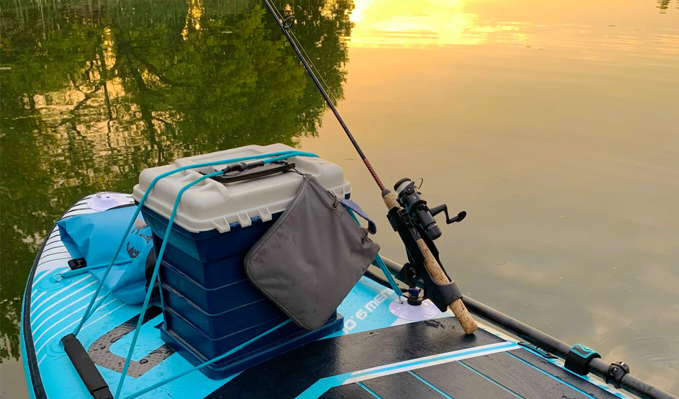 Paddle board with fishing setup