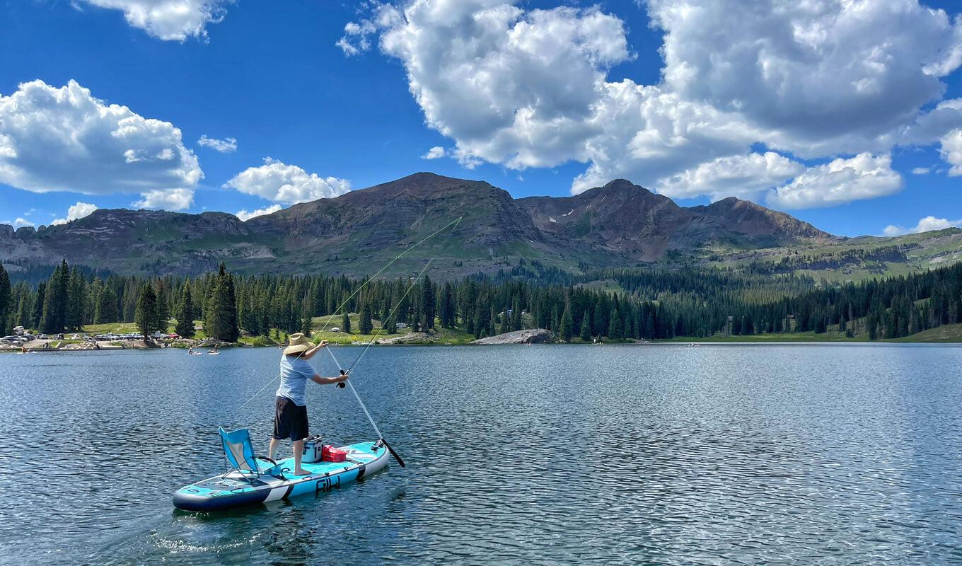 Man fishing on GILI Manta inflatable paddle board