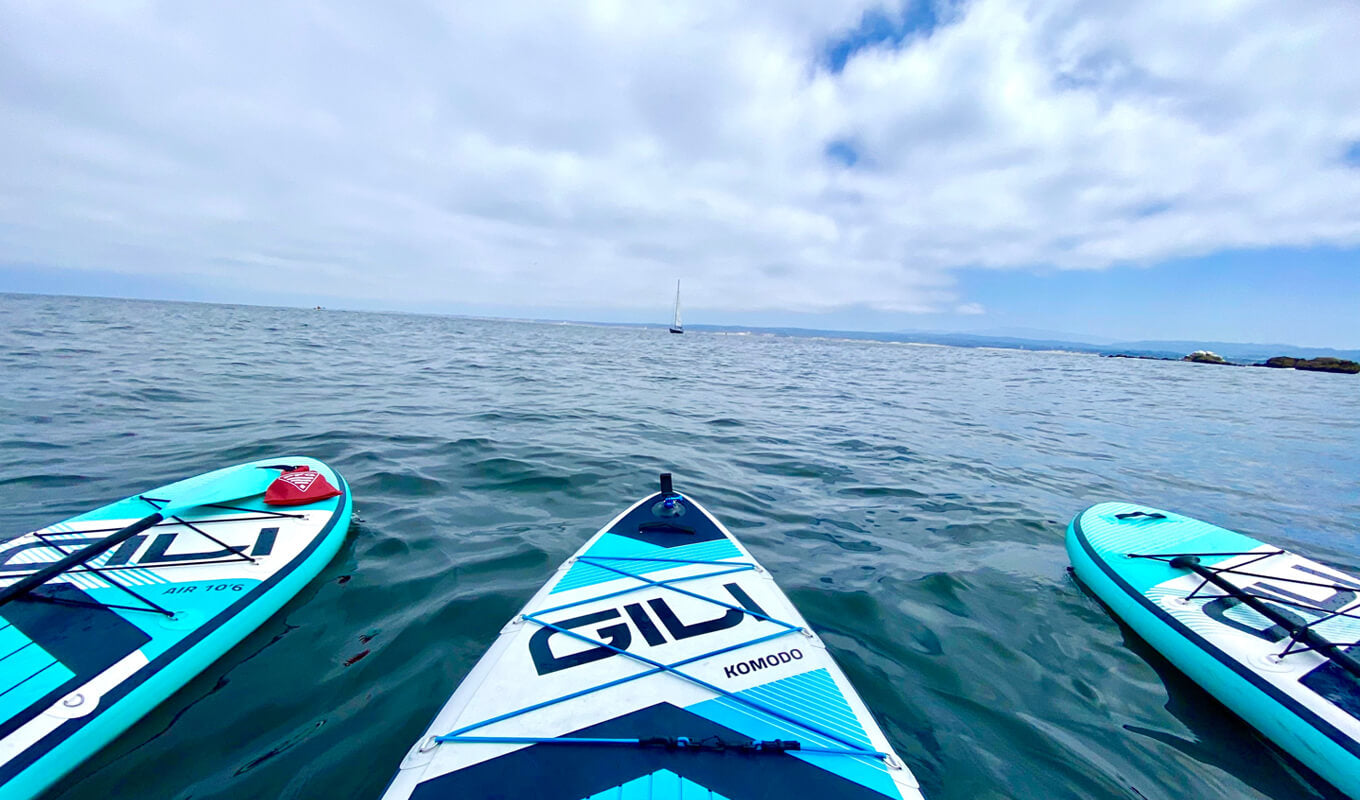GILI inflatable paddle board lined up on the sea