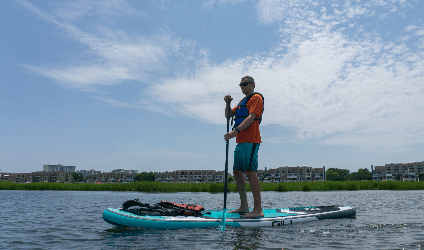 paddle board life jacket man on board